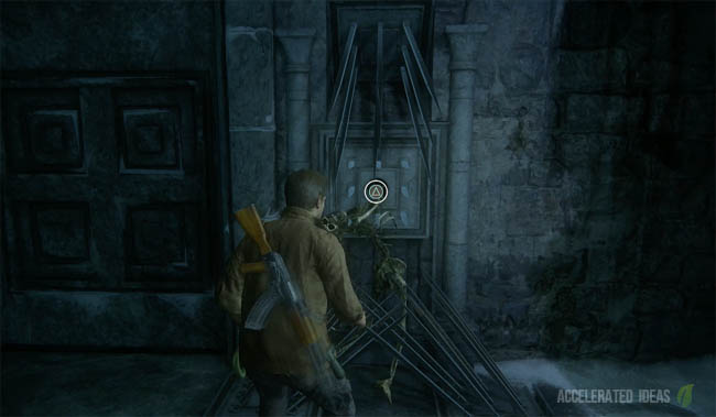 Skeleton hand in wall by locked door